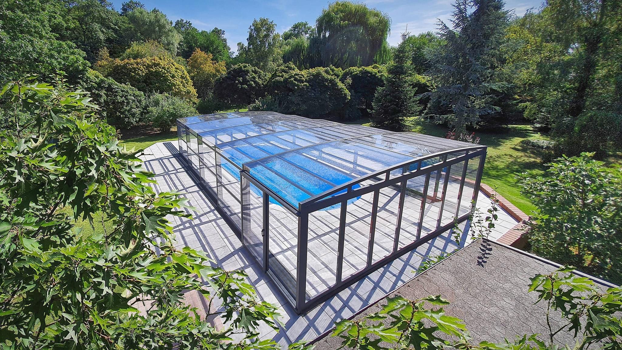 sleek polycarbonate swimming pool enclosure