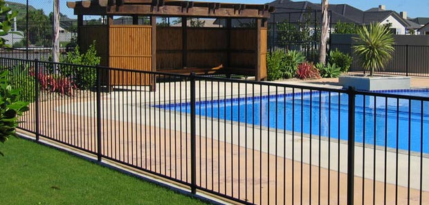 Section of metal swimming pool fence