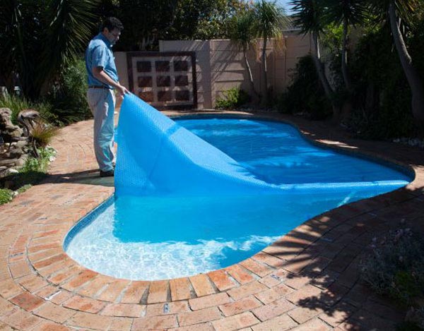 Installing solar pool cover