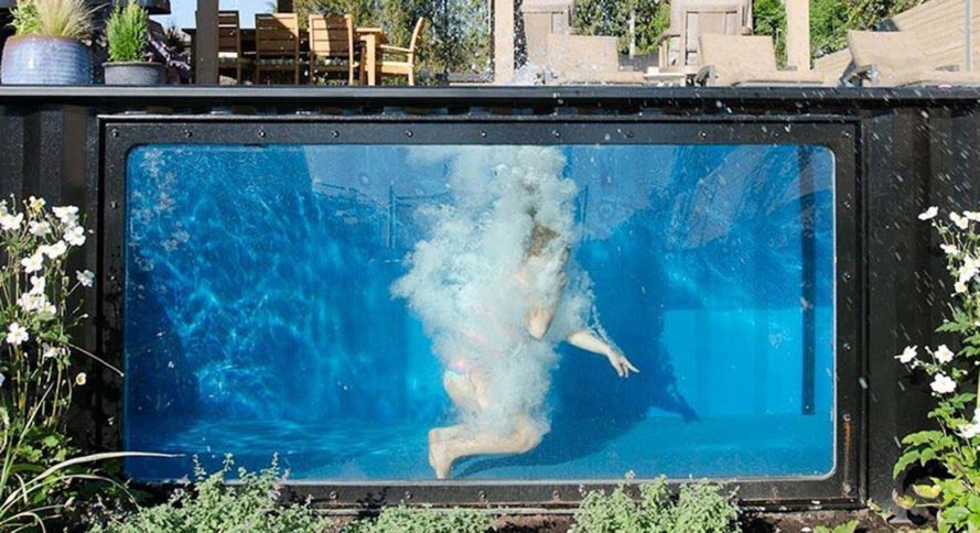 Shipping container pool with a "window"