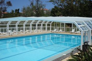 Fixed swimming pool enclosure