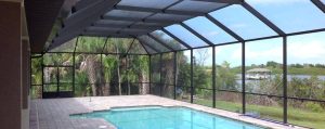 Swimming pool patio enclosure