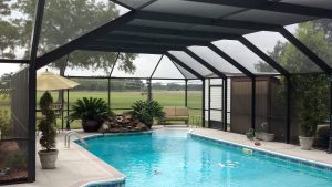 Screen swimming pool enclosure