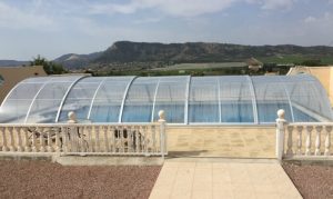 Clear swimming pool enclosure