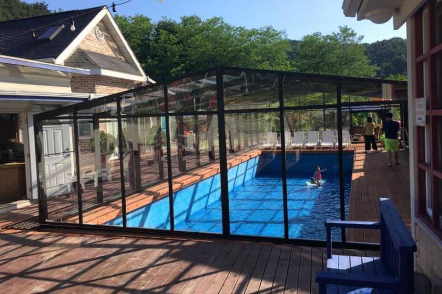 6 A commercial pool enclosure enhances beauty