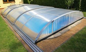 Low profile pool enclosure